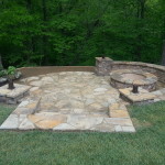 Fire Pit in a Hill, Retaining wall, Water Feature and lights.