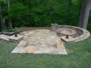 Fire Pit in a Hill, Retaining wall, Water Feature and lights.