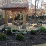 Fire pit, cazebo, and gravel patio