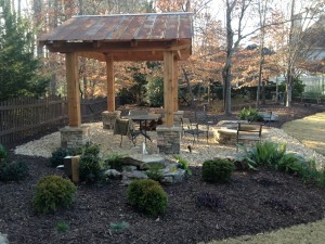 Fire pit, cazebo, and gravel patio
